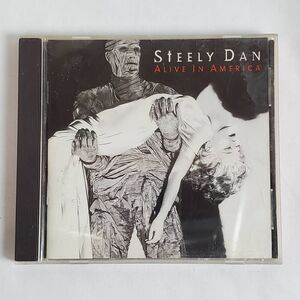 Steely Dan – Alive In America (1995 CD, Giant Records)